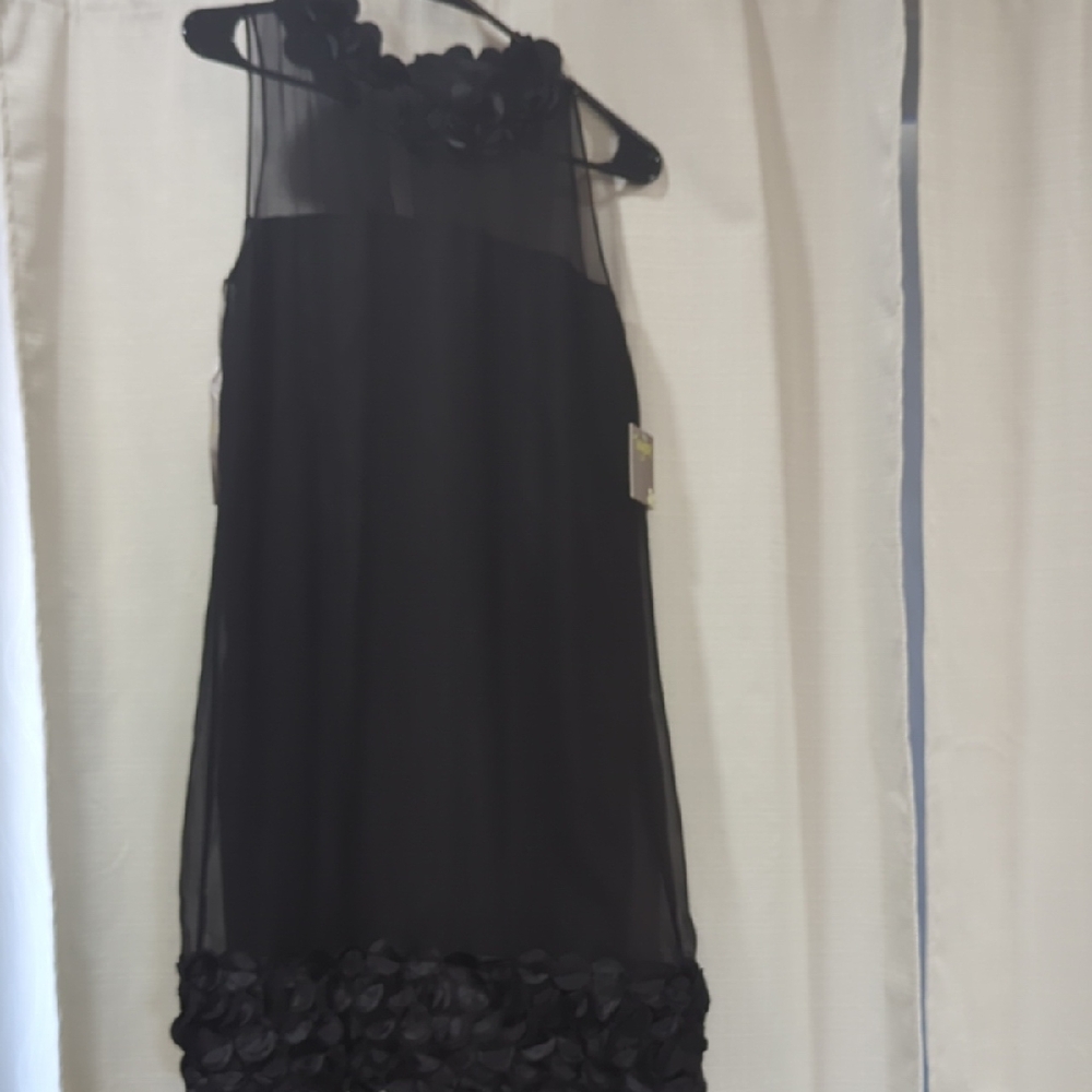 Taylor Elegant Black Sleeveless Dress with Floral Vintage Accents.